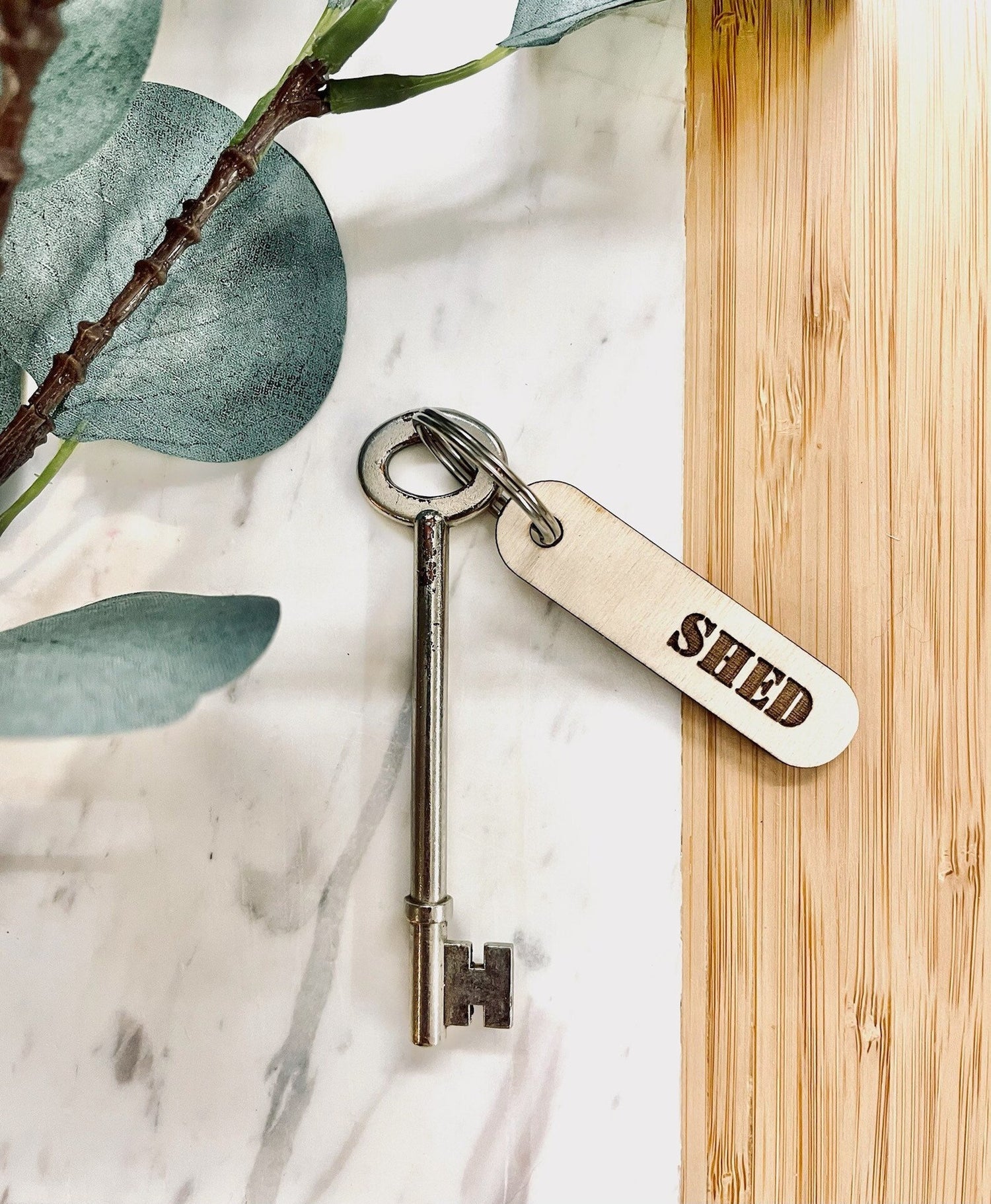 Cotswolds Laser Company Accessories and Keychains Collection, Image of a wooden key fob with shed as the label